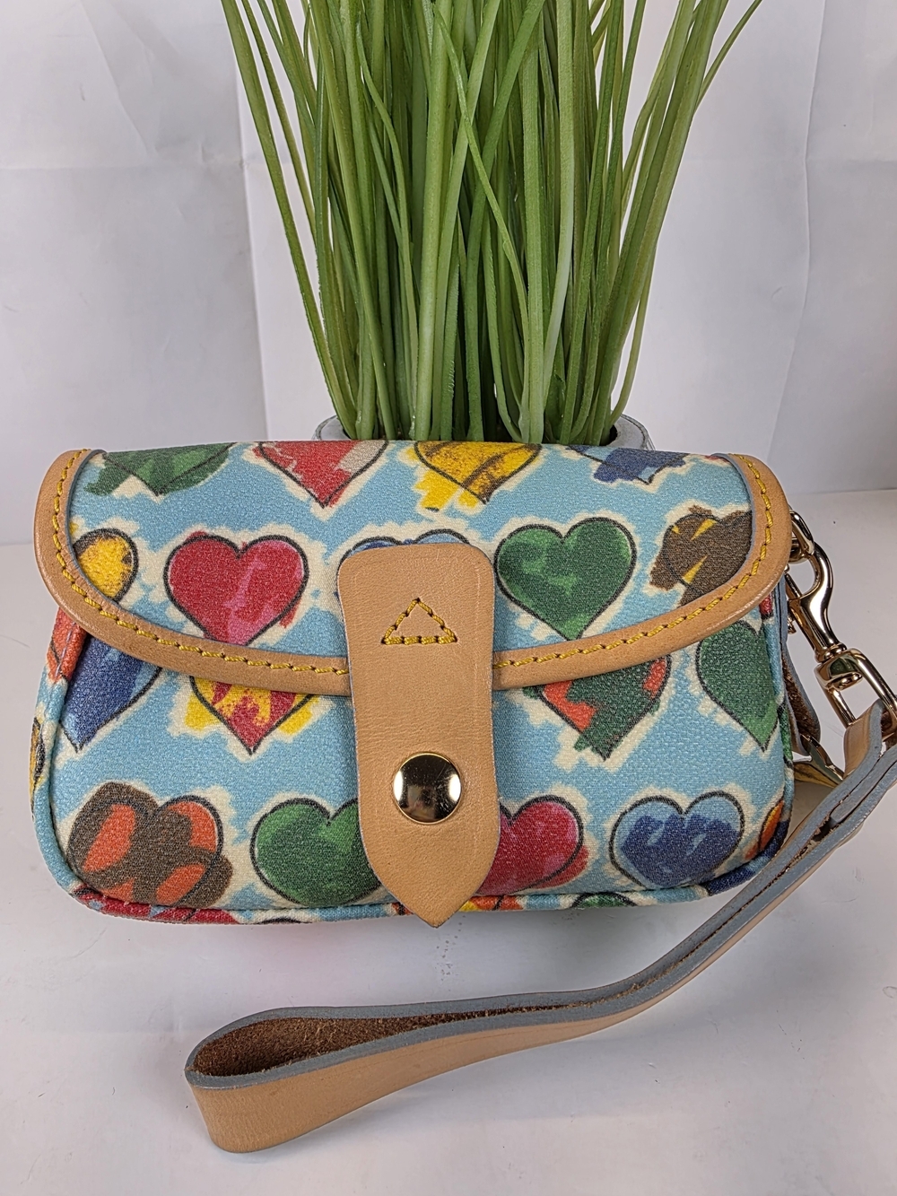 Dooney & Bourke Light Blue Multicolor Heart Print Wristlet with Tan Trim Bag